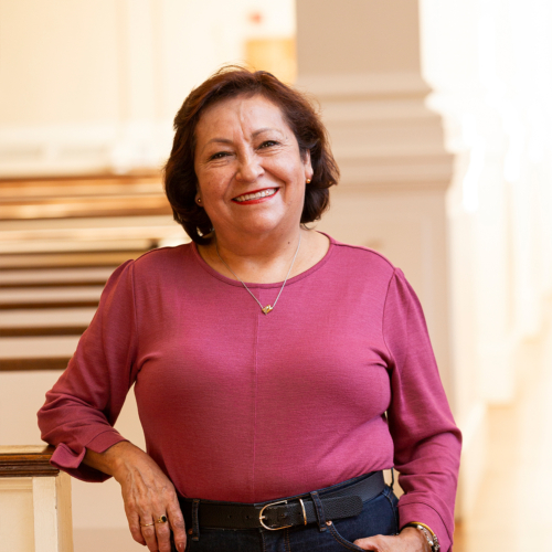 Gladys Murillo in the pews of Village Church