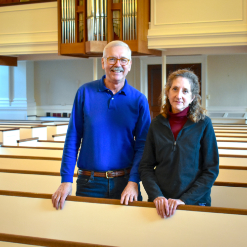 Ernie and Candace Sutcliffe in church pew